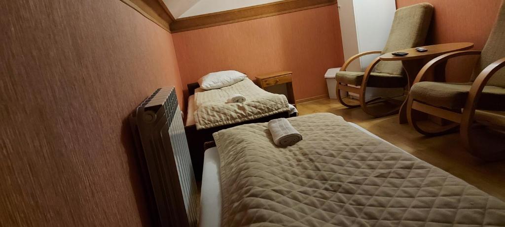 Posteľ alebo postele v izbe v ubytovaní Motel Panorama