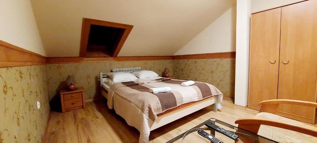 Posteľ alebo postele v izbe v ubytovaní Motel Panorama