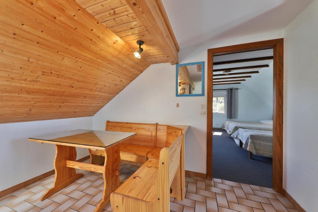 Postel nebo postele na pokoji v ubytování Gîte à La Montagne