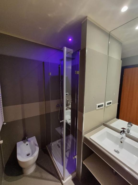 Koupelna v ubytování Hotel Olimpia
