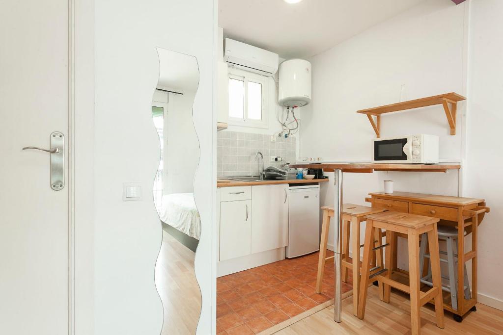Kuchyňa alebo kuchynka v ubytovaní SAGRADA FAMILIA APARTAMENT