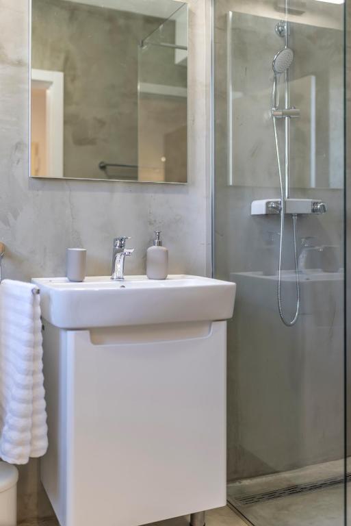 Kúpeľňa v ubytovaní PORTO SERENO apartments