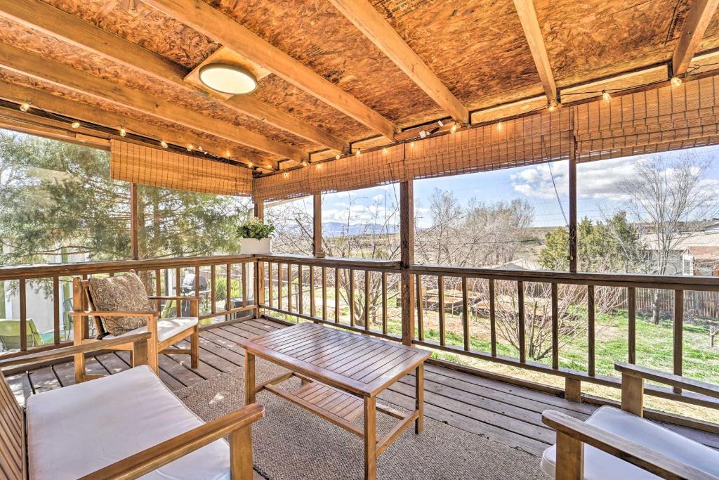 a large screened porch with chairs and a table at Eco-Friendly Escape in Cortez - Pets are Welcome! in Cortez