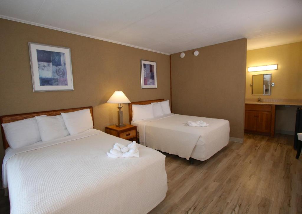 Postel nebo postele na pokoji v ubytování Crusader Oceanfront Resort