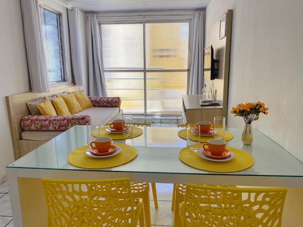 Χώρος καθιστικού στο Apê em Guest House na Praia do Sul