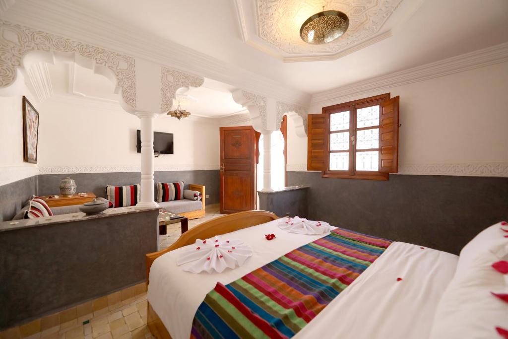 Postel nebo postele na pokoji v ubytování Riad Atlas Acacia