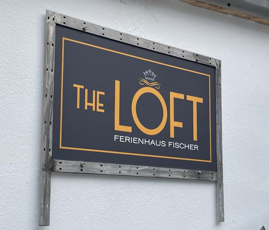 a sign on a wall that reads the loot at LOFT Ferienhaus Fischer in Goldkronach