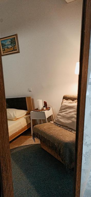 Posteľ alebo postele v izbe v ubytovaní Studio Apartment Nika FREE PARKING