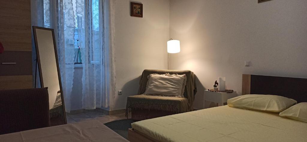 Posteľ alebo postele v izbe v ubytovaní Studio Apartment Nika FREE PARKING