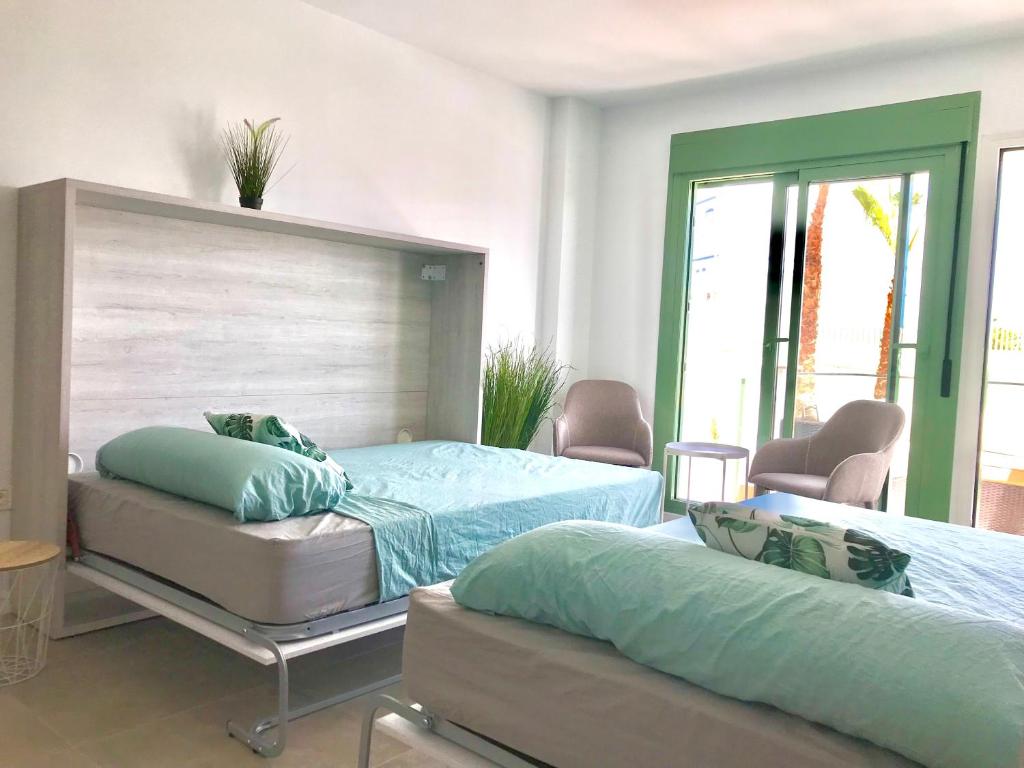 Postel nebo postele na pokoji v ubytování BeachHomesMojacar CantalHomes