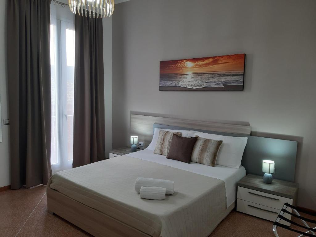 Postel nebo postele na pokoji v ubytování B&B Costa Sicula