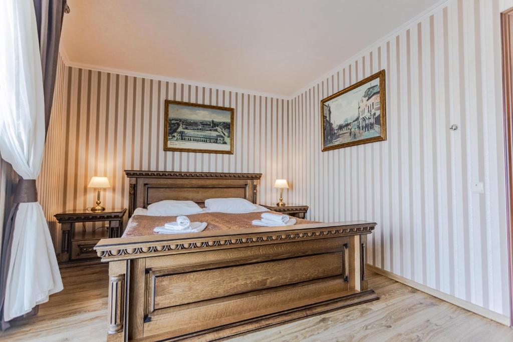 Postel nebo postele na pokoji v ubytování Guest House Villa Lamperti