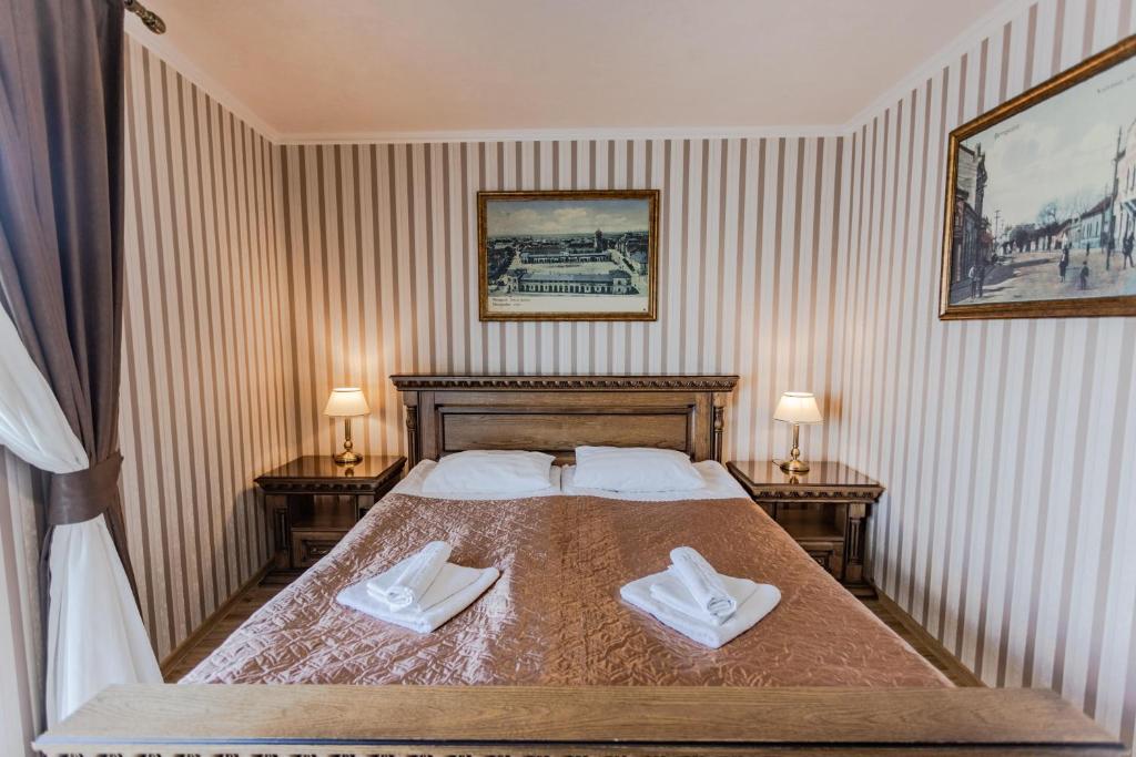 Postel nebo postele na pokoji v ubytování Guest House Villa Lamperti