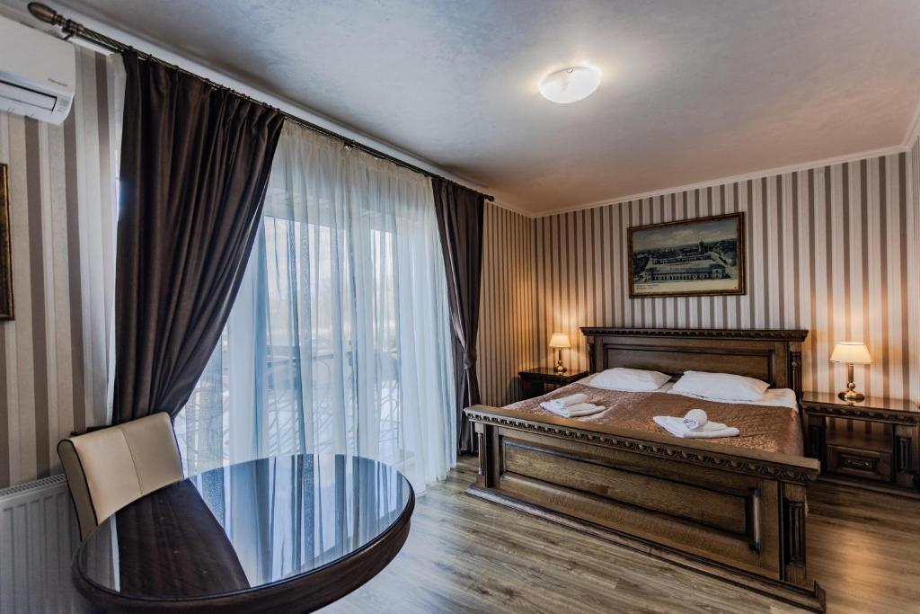 Postel nebo postele na pokoji v ubytování Guest House Villa Lamperti