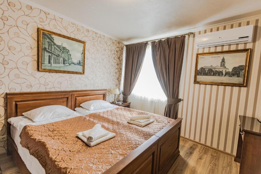 Postel nebo postele na pokoji v ubytování Guest House Villa Lamperti