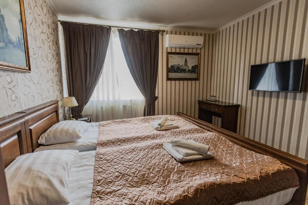 Postel nebo postele na pokoji v ubytování Guest House Villa Lamperti