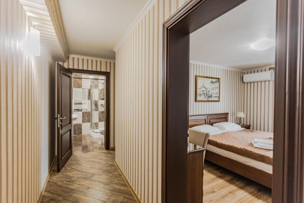 Postel nebo postele na pokoji v ubytování Guest House Villa Lamperti