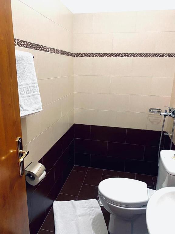 Koupelna v ubytování HOTEL RESTORANT VIKTORIA