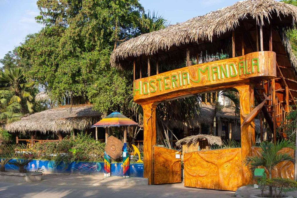 a resort with a sign that reads eastern market at Hostería Mandála in Puerto López