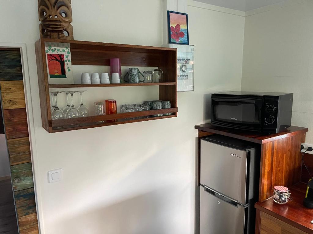 Kuchyň nebo kuchyňský kout v ubytování bungalow chez sofpat