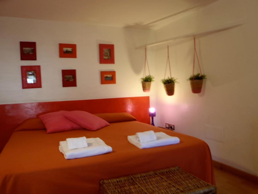 Łóżko lub łóżka w pokoju w obiekcie Gianluca's Room