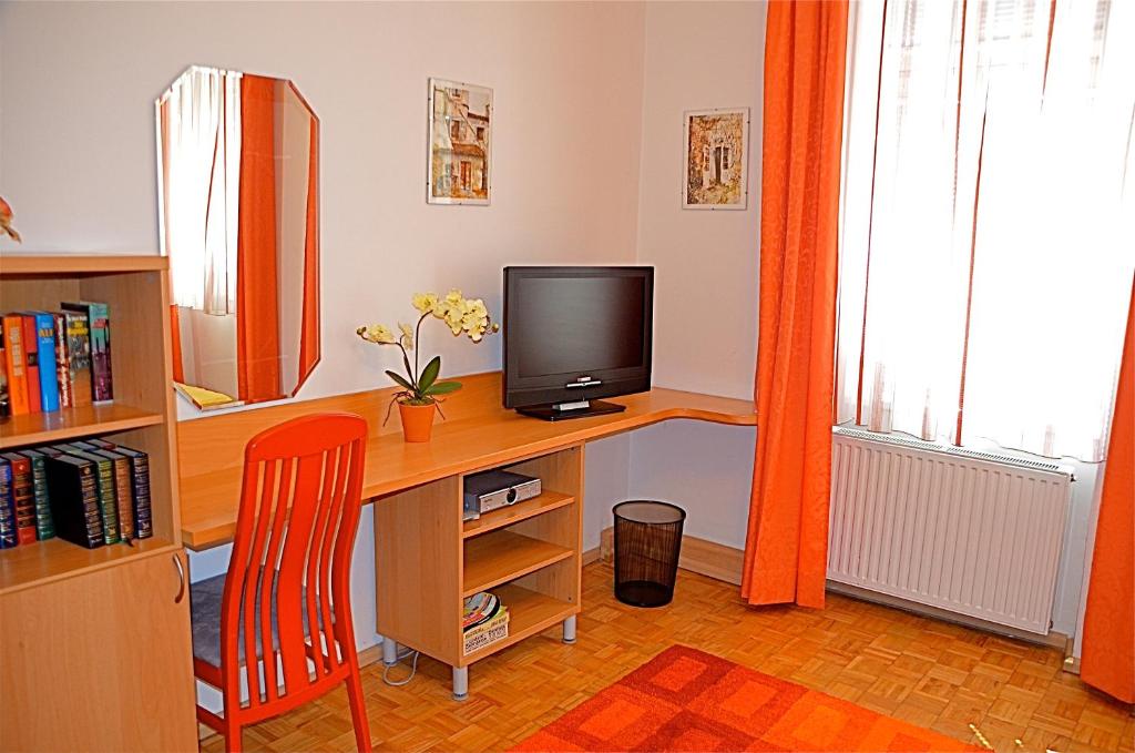Televízia a/alebo spoločenská miestnosť v ubytovaní Apartment Philadelphia Vienna