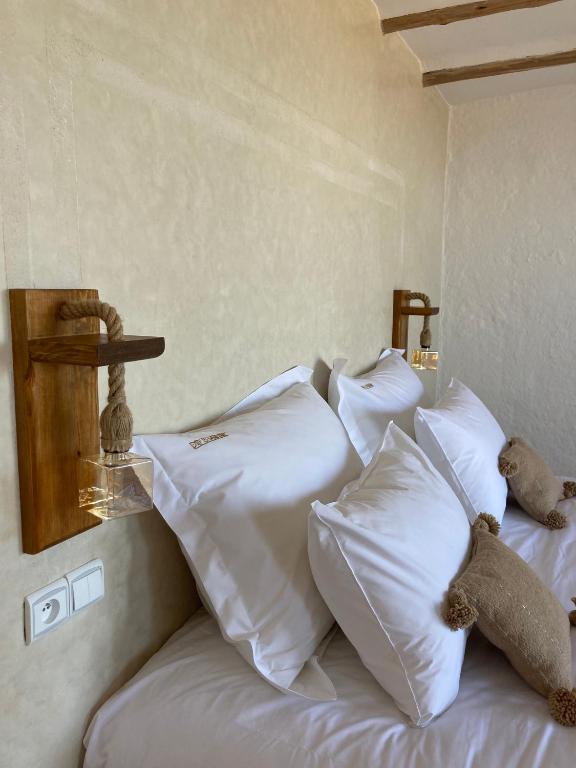 Postel nebo postele na pokoji v ubytování Dar El Mandar - Ferme & Table d'Hôte Berbère