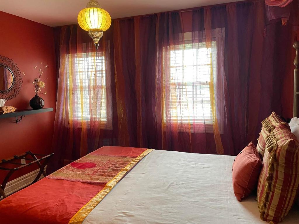 Postel nebo postele na pokoji v ubytování Globetrotters B&B