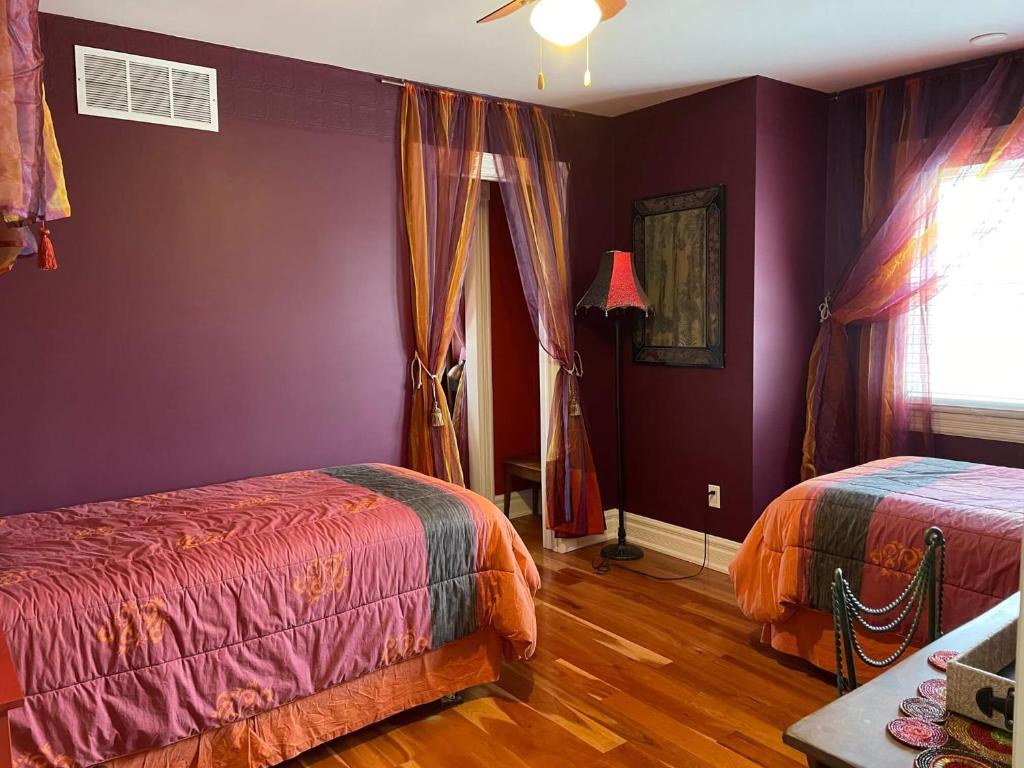 Postel nebo postele na pokoji v ubytování Globetrotters B&B