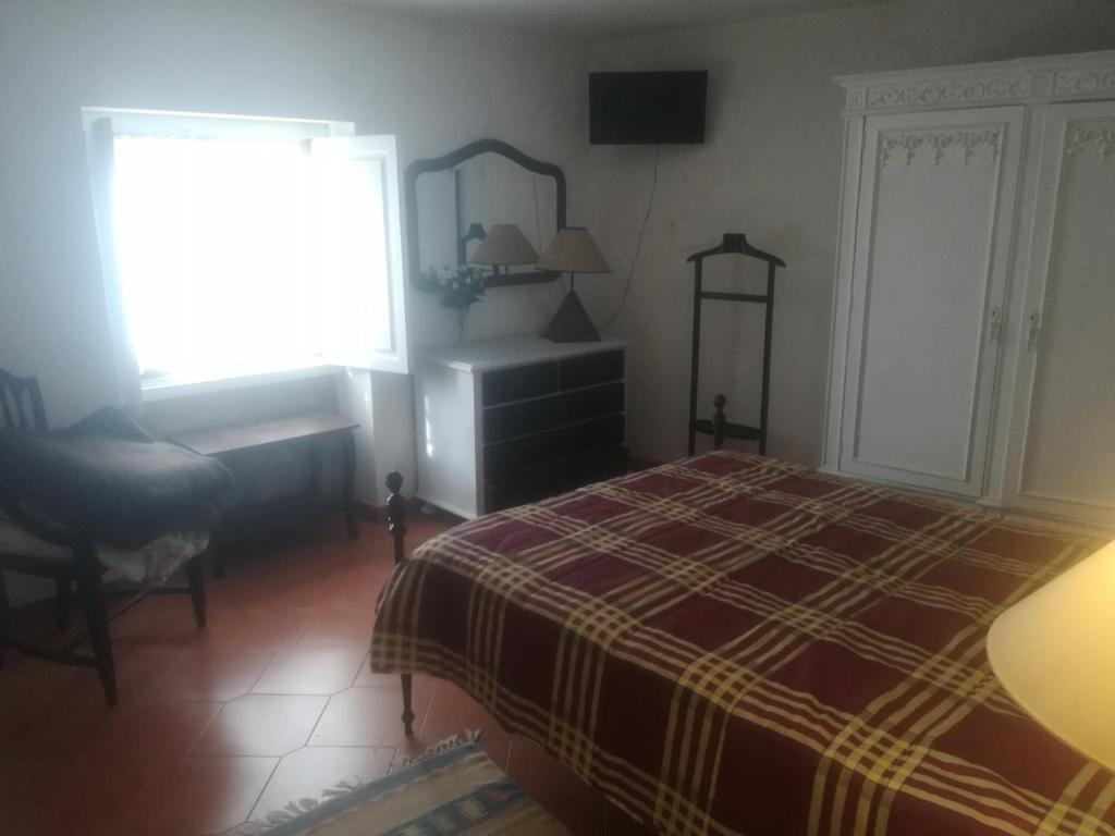 Postel nebo postele na pokoji v ubytování QUINTA DO CAMBEIRO