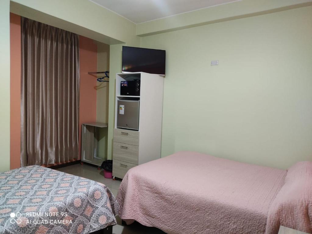 Postel nebo postele na pokoji v ubytování Rooms MD