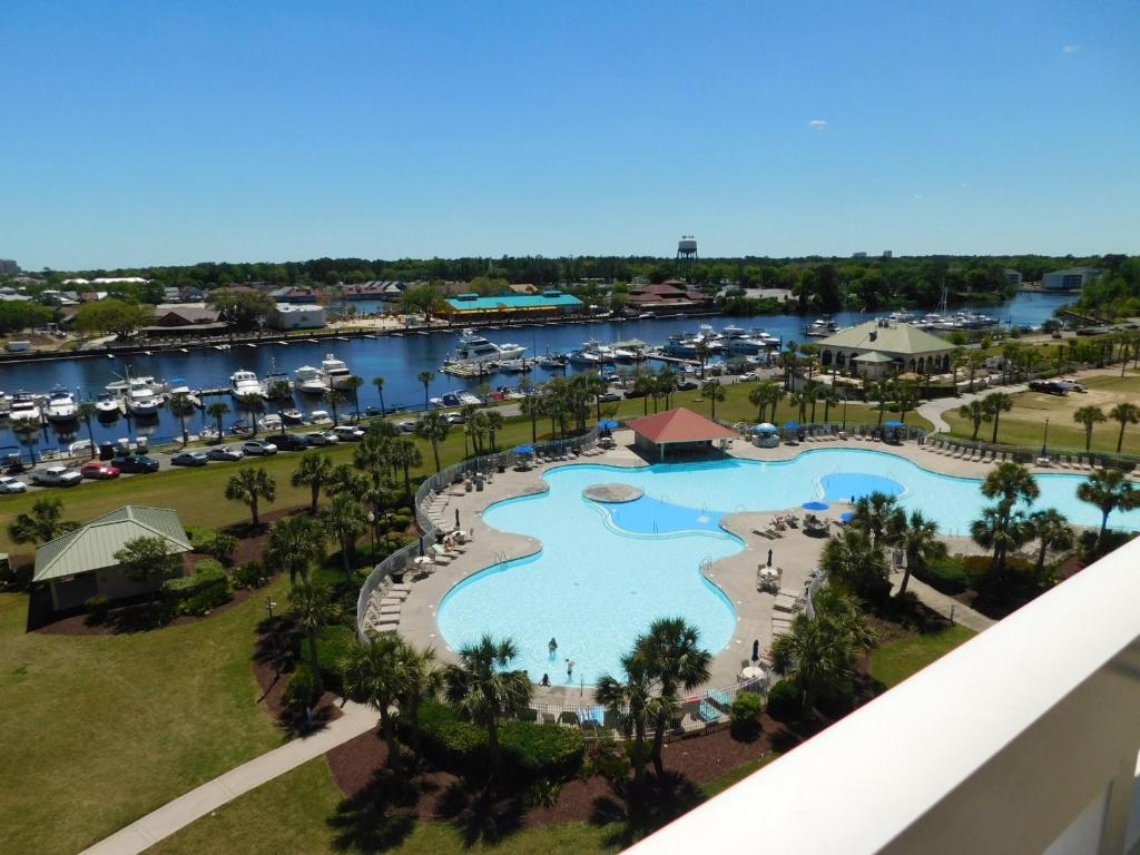 an aerial view of a resort with a marina at Yacht Club Villas #2-204 condo in Myrtle Beach