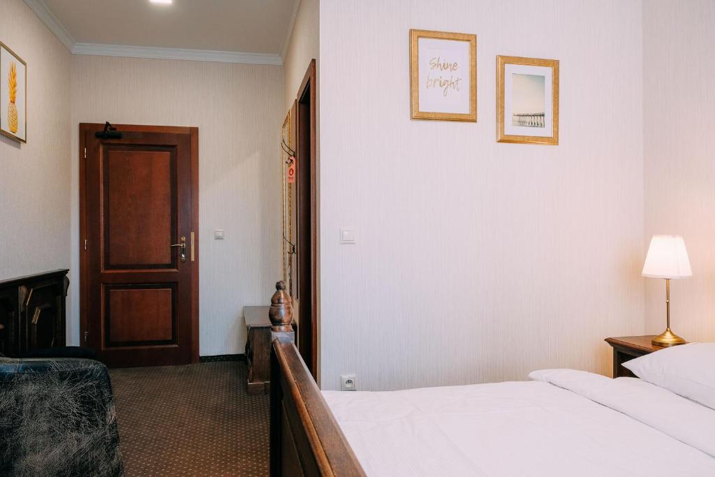 Postel nebo postele na pokoji v ubytování Pension Relish