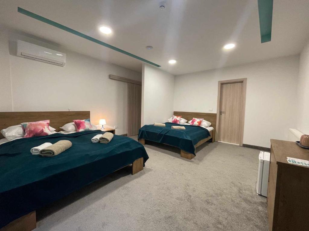 Postel nebo postele na pokoji v ubytování Hotel Story