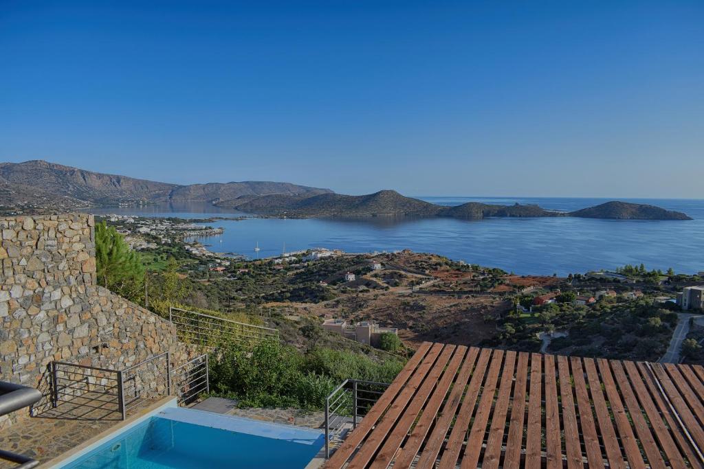 a view of the ocean from the roof of a house at Elounda Solfez Villas in Elounda