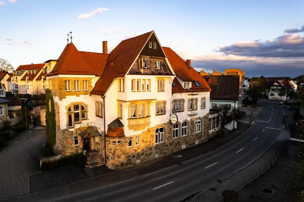 a large building on the side of a street at Hotel Sonne in Gottmadingen