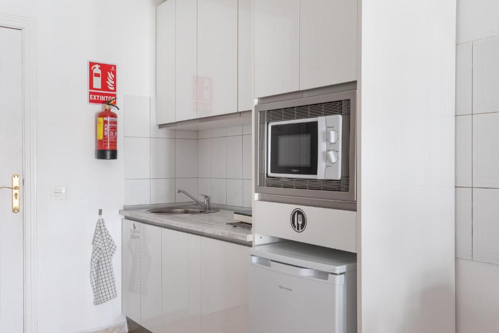 Kuchyň nebo kuchyňský kout v ubytování MarbellaTown