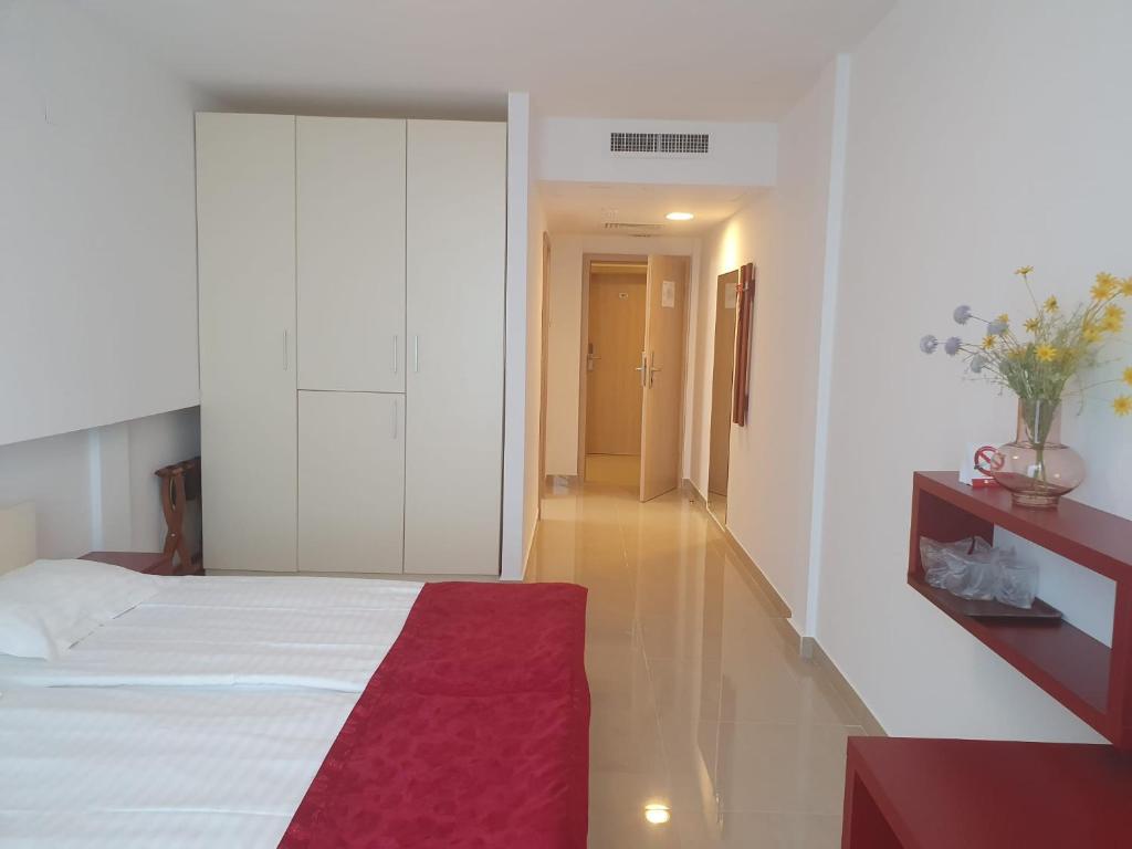 Postel nebo postele na pokoji v ubytování Hotel Hefaistos - Mamaia