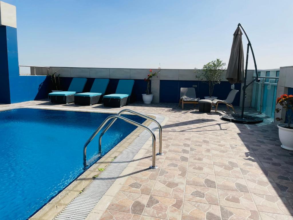 Bazén v ubytování Al Mansour Plaza Hotel nebo v jeho okolí