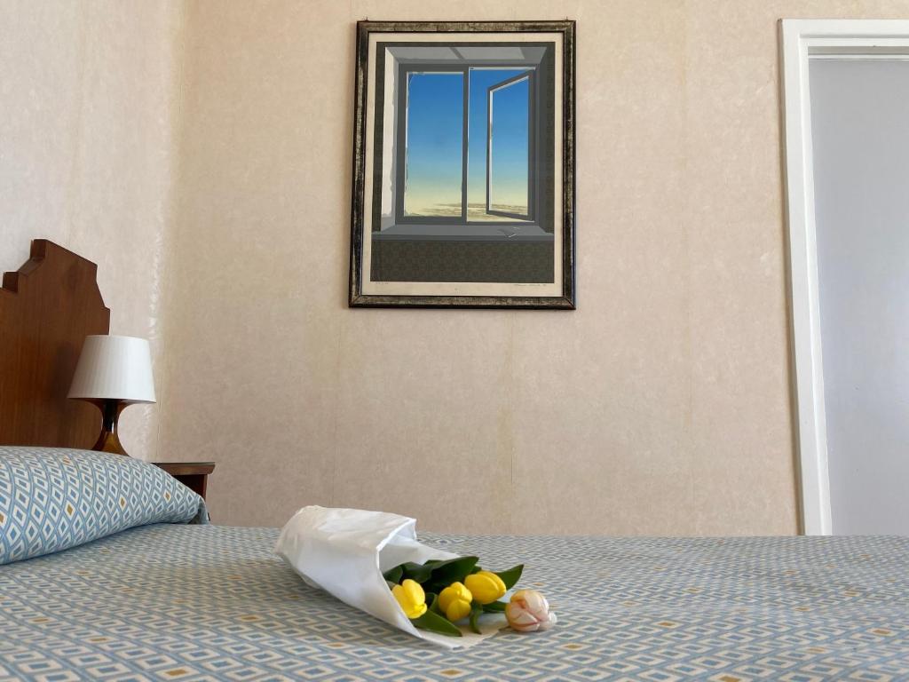 Postel nebo postele na pokoji v ubytování Hotel Le Najadi