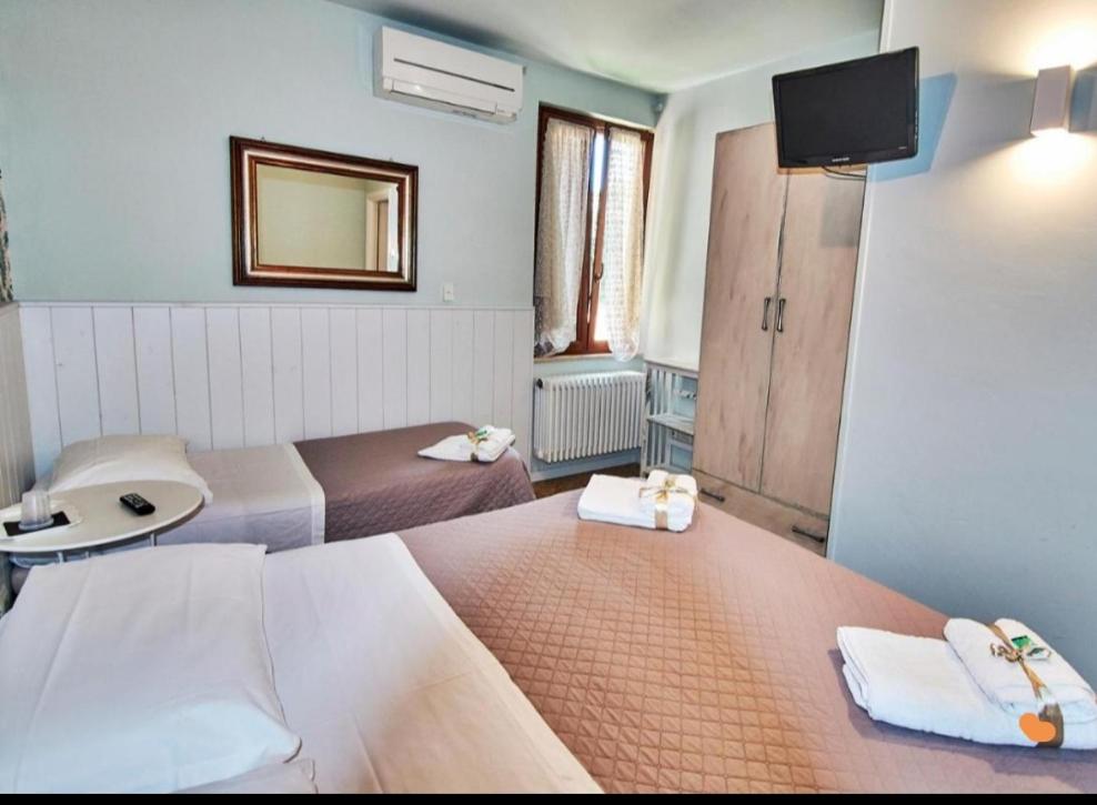Posteľ alebo postele v izbe v ubytovaní Del Castello