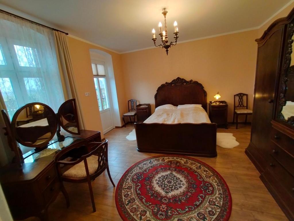 Postel nebo postele na pokoji v ubytování Dom Gościnny Ostoja