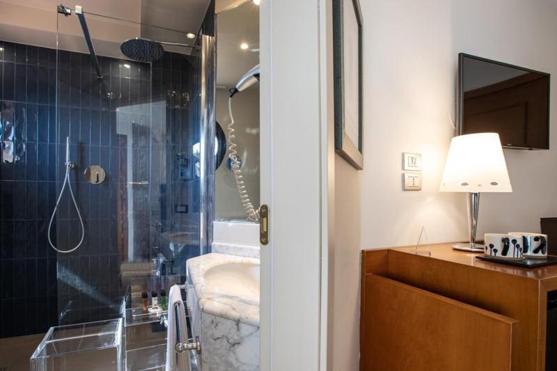 Um banheiro em Dal Moro Gallery Hotel
