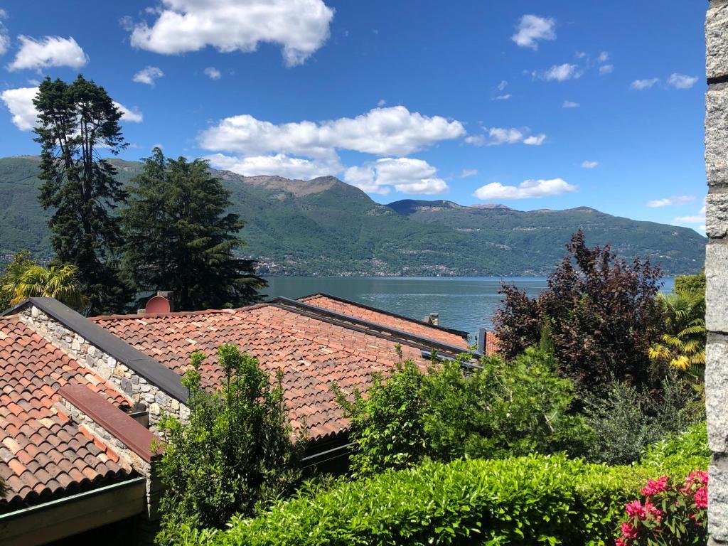 a view of a lake from a house at Casa Anna - Parco Hermitage in Porto Valtravaglia
