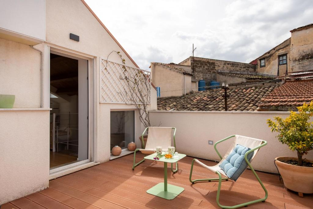 A balcony or terrace at Vittorio Emanuele apartment with terrace by Wonderful Italy