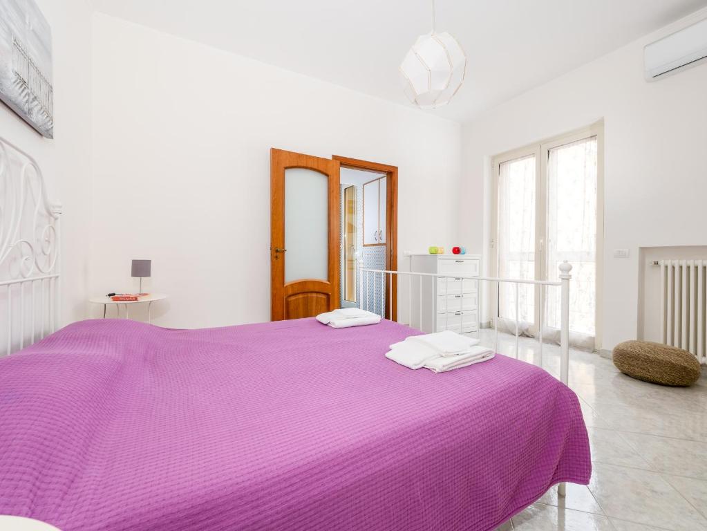 Łóżko lub łóżka w pokoju w obiekcie YourHome - Corso Italia Apt in Sorrento