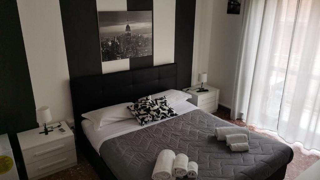 Łóżko lub łóżka w pokoju w obiekcie Casa Sofia
