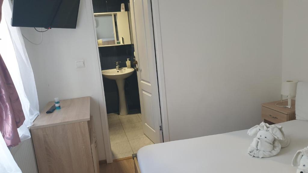 Postel nebo postele na pokoji v ubytování Casa Nicholas