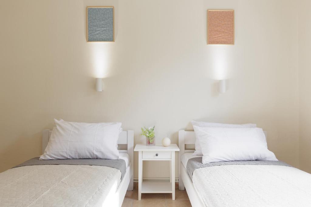 Postel nebo postele na pokoji v ubytování Central Apartments by Konnect, Ipsos
