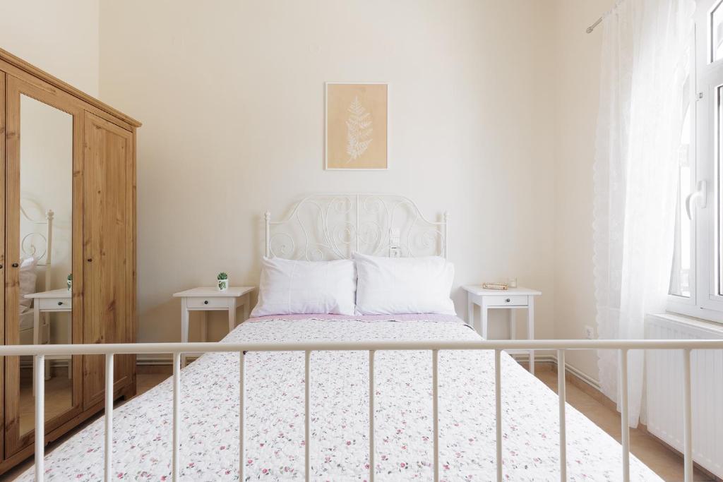 Postel nebo postele na pokoji v ubytování Central Apartments by Konnect, Ipsos